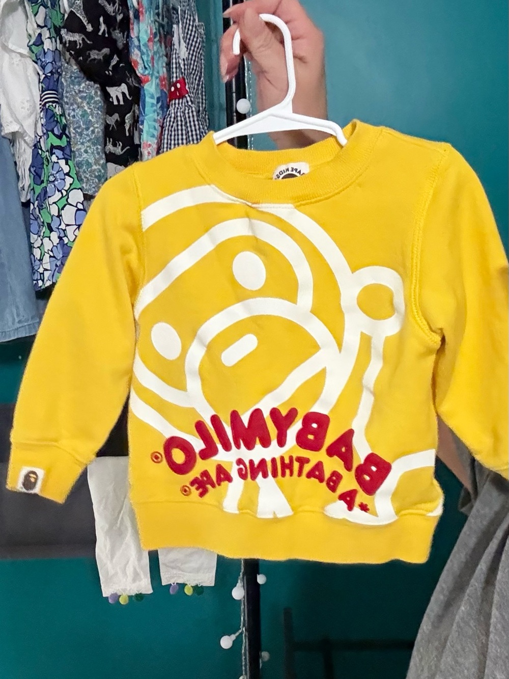 Bape Kids Yellow Sweatshirt with White Ape Graphic and Red Logo